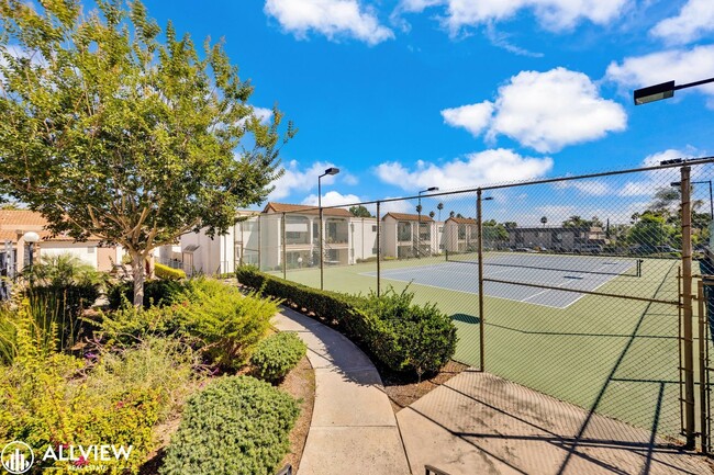 Building Photo - Modern 1-Bed Upstairs Condo with Garage & ...