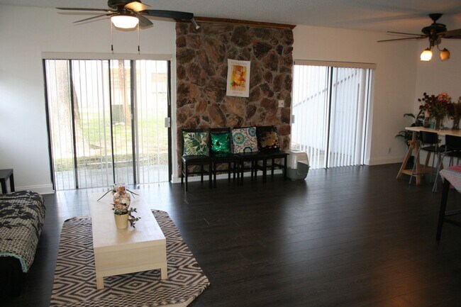Building Photo - Pretty, Huge, Updated Townhome