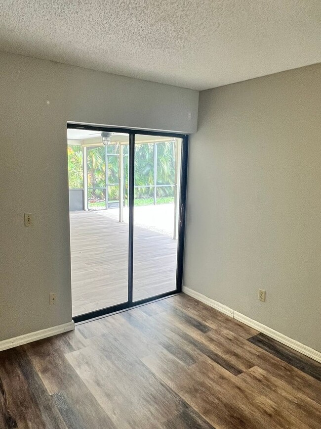 Building Photo - BEAUTIFUL 3 BEDROOM POOL HOME IN SANDPIPER...
