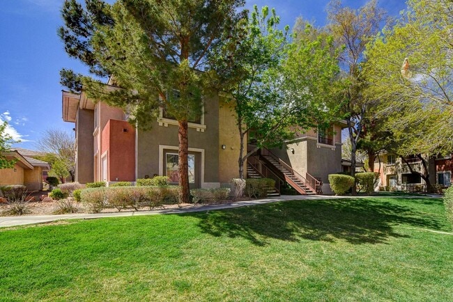 Building Photo - Upgraded First-Floor Condo in a Gated Summ...