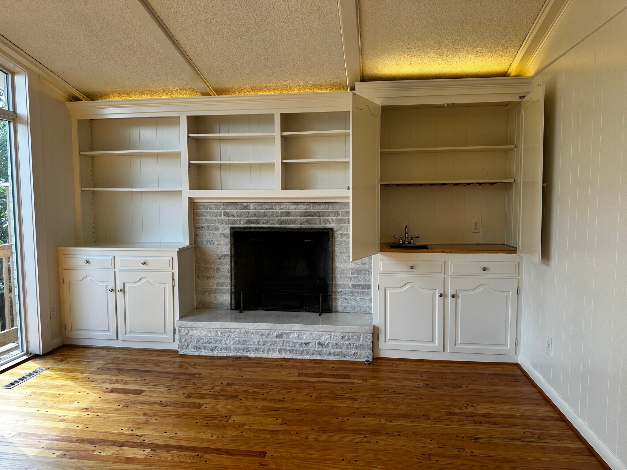 Wet Bar and surrounding bookshelves and cabinets - 3030 Hardale Blvd