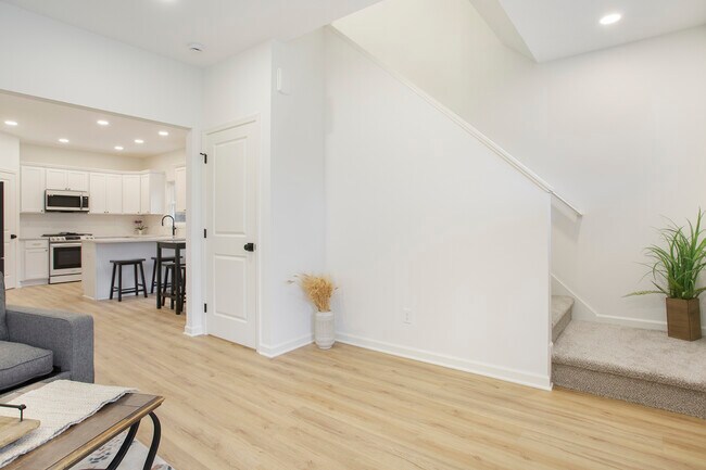living & stairs to upstairs/basement - 174 N Monroe St