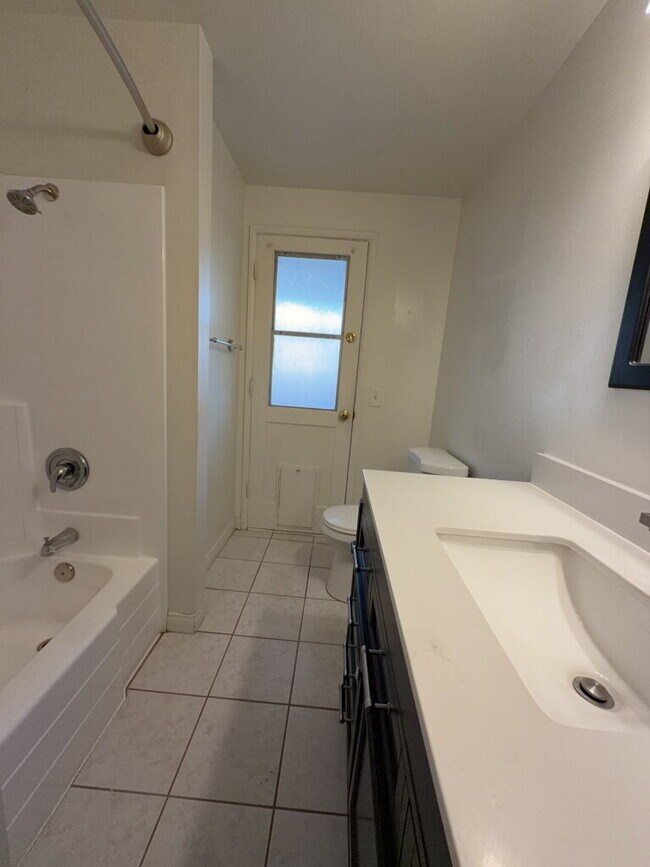 Building Photo - "Charming Riverside Retreat: Spacious 4-Be...