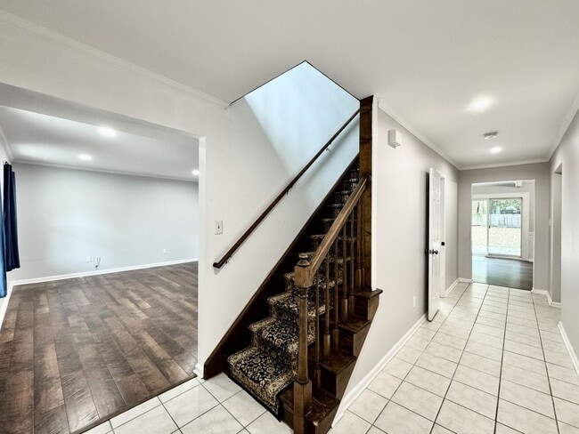 Building Photo - Ready NOW! A 4/2.5 in Glenwood! A Pet Friendly Home w/a HUGE Fenced Yard, Attached Garage!