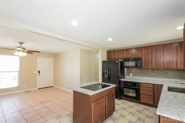 Building Photo - 2644 E 97th Ave