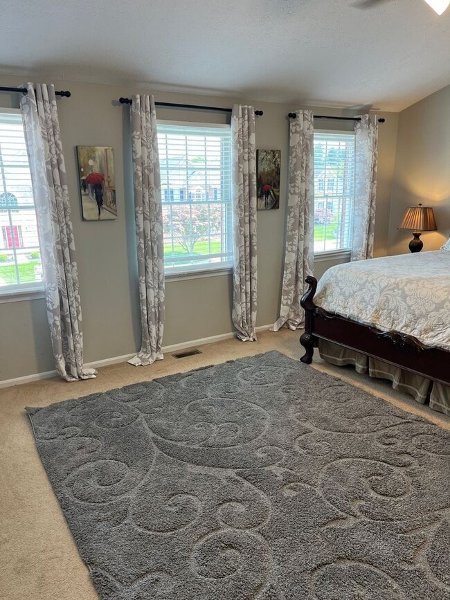 Building Photo - Updated & Landscaped 4 Bedroom, 4 Bath Hom...