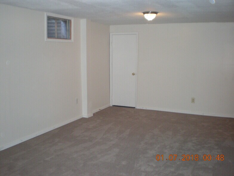 One of two storage rooms in lower level. - 1160 Clinton St