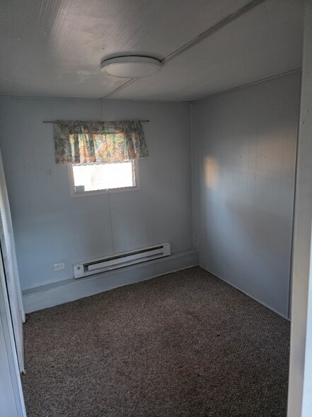 Building Photo - 10 8th Ave