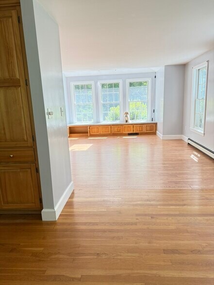 Living room window seat under sky light - 20 Partridge Ln