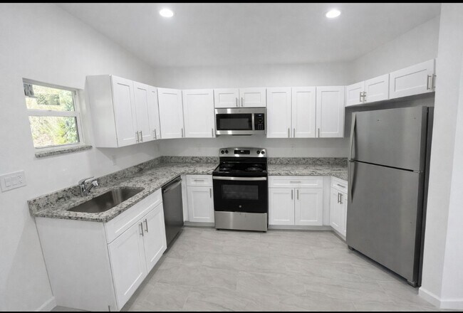 Building Photo - Brand New house in Lehigh Acers 2 Bedrooms 2 baths and 1 car garage