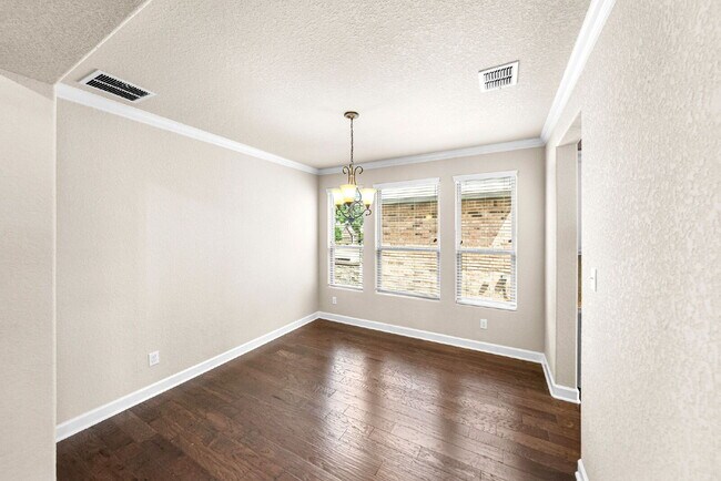Building Photo - No Rear Neighbors, 3 Car Garage, a Chef's Kitchen, and Room for Everyone