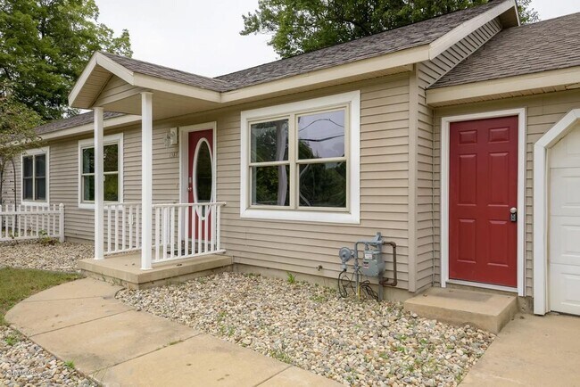 Building Photo - Spacious 3BR Duplex with Finished Basement & 2-Car Garage in Otsego