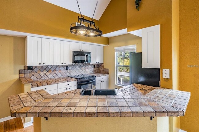 Building Photo - 9156 Lake Chase Island Way
