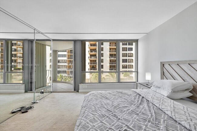 Building Photo - 10155 Collins Ave
