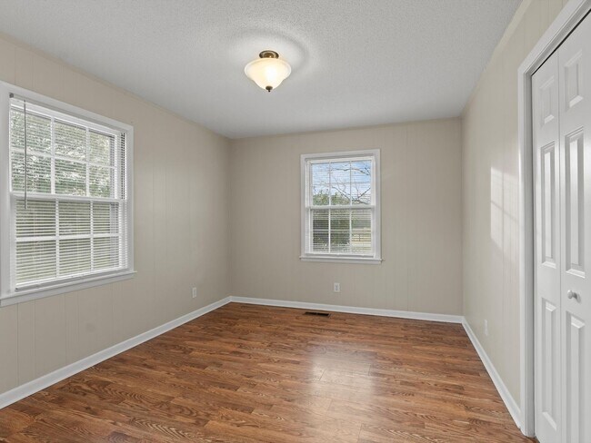 Building Photo - Charming 4-bedroom, 2-bath ranch-style home situated on just over 2 acres!