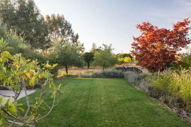 Building Photo - PURE Property Management Presents