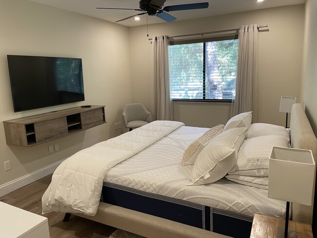 Bedroom, king size bed, 55” smart tv - 1709 Pelican Cove Rd