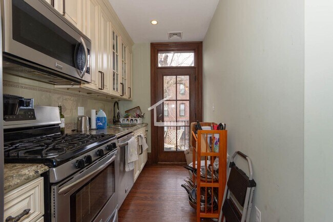 Building Photo - 9/1 Modern 4BR/2BA with AC, laundry in unit @ Brigham Circle!