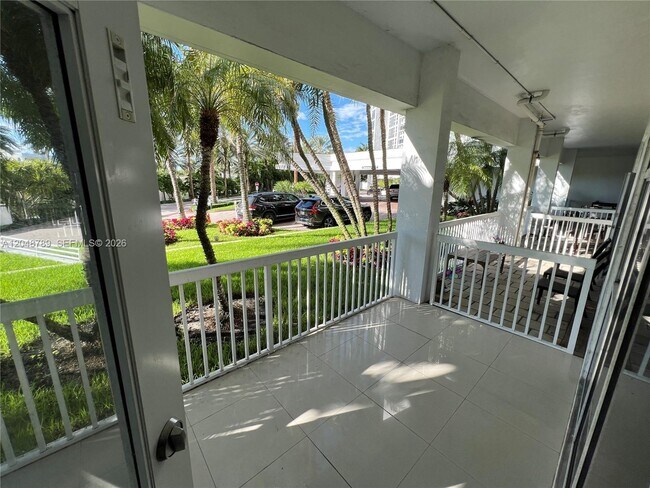 Building Photo - 10275 Collins Ave