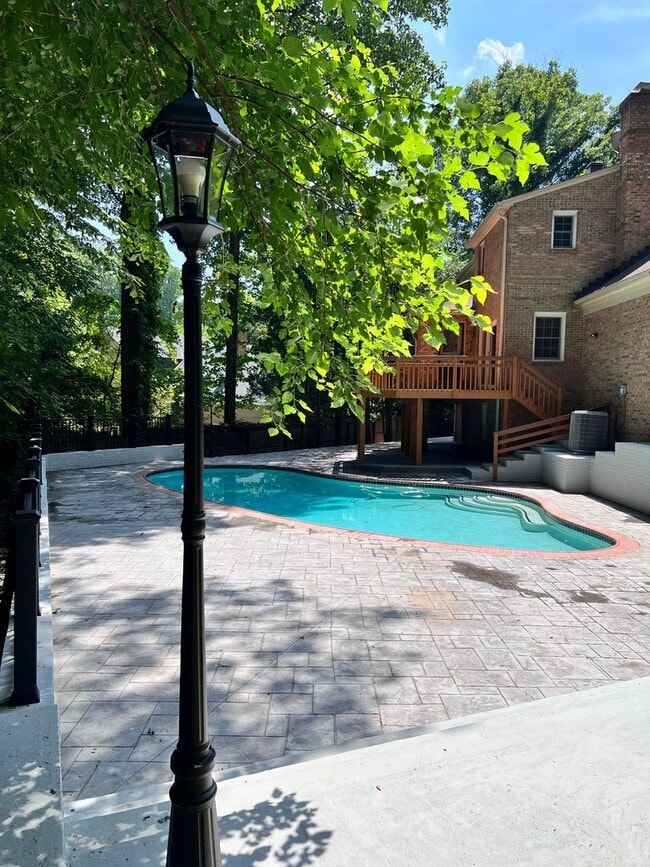 Building Photo - 5 BR 4.5 BA home with inground heated pool and extensive hardscape!