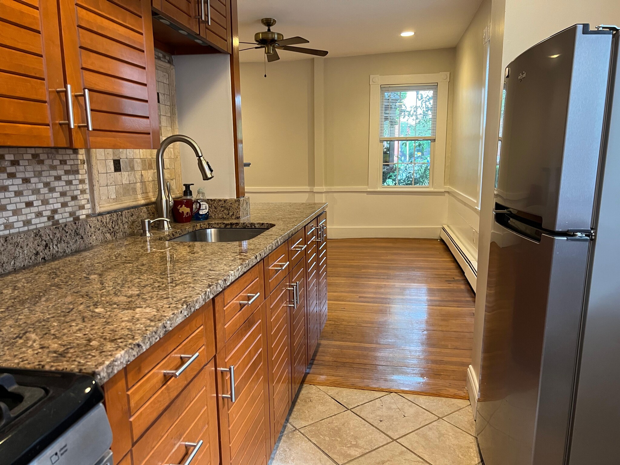 Updated Kitchen opens to living room - 32 Lynde St