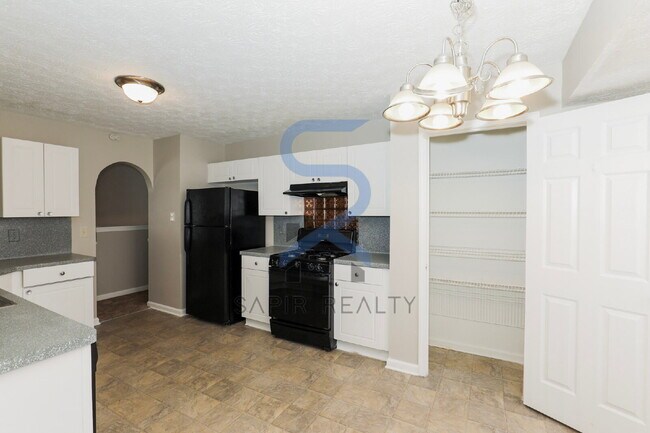 Building Photo - Move in before February 28th and choose your reward: a $250 Amazon Gift Card or a 55" Smart TV!