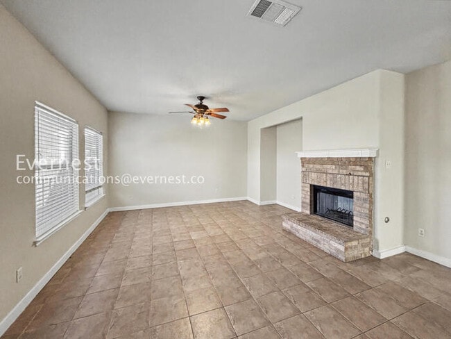 Building Photo - Charming 4-Bedroom Haven with Fireplace and Serene Outdoor Living / Pet-Friendly / Available Now!