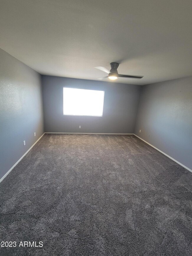 Building Photo - 5846 W Gelding Dr