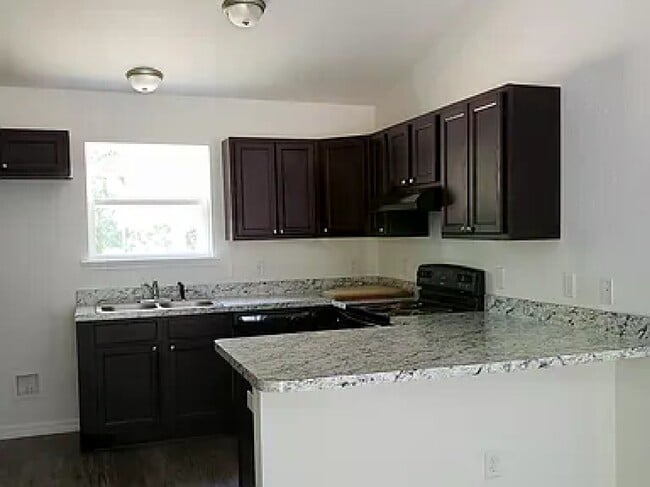 Building Photo - 5463 NW 54th Pl