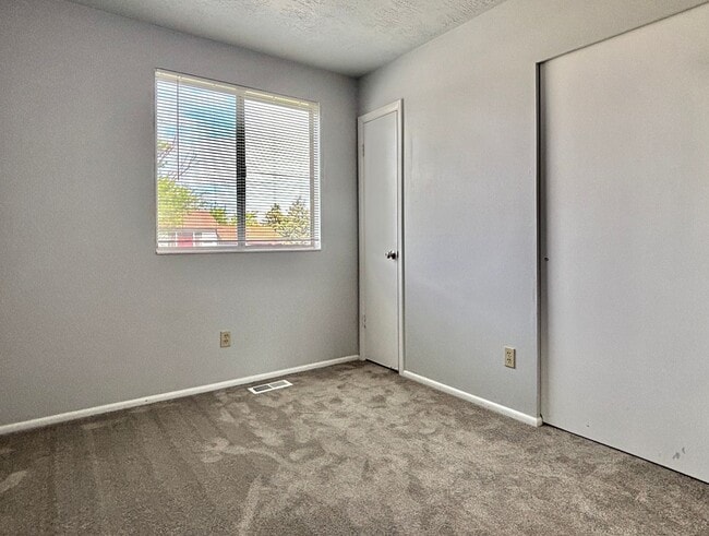 Building Photo - Cozy Home with New Paint & Flooring!