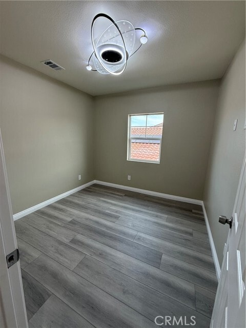 Building Photo - 7398 N Maple Ave