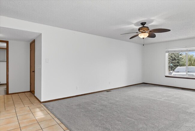 Building Photo - 4BR/4BA Updated Home with Finished Basement Suite & Landscaped Yard