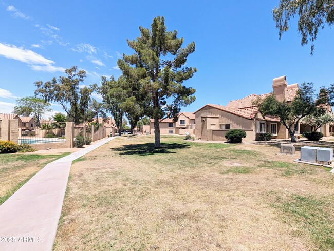 Building Photo - 4601 N 102nd Ave