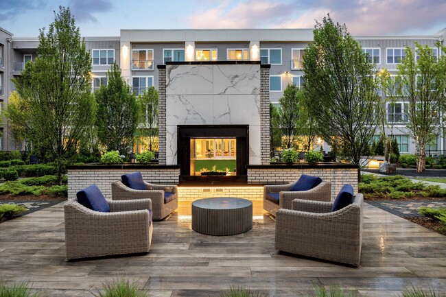 Social courtyard features a variety of conversational seating areas - Hanover Hyannis