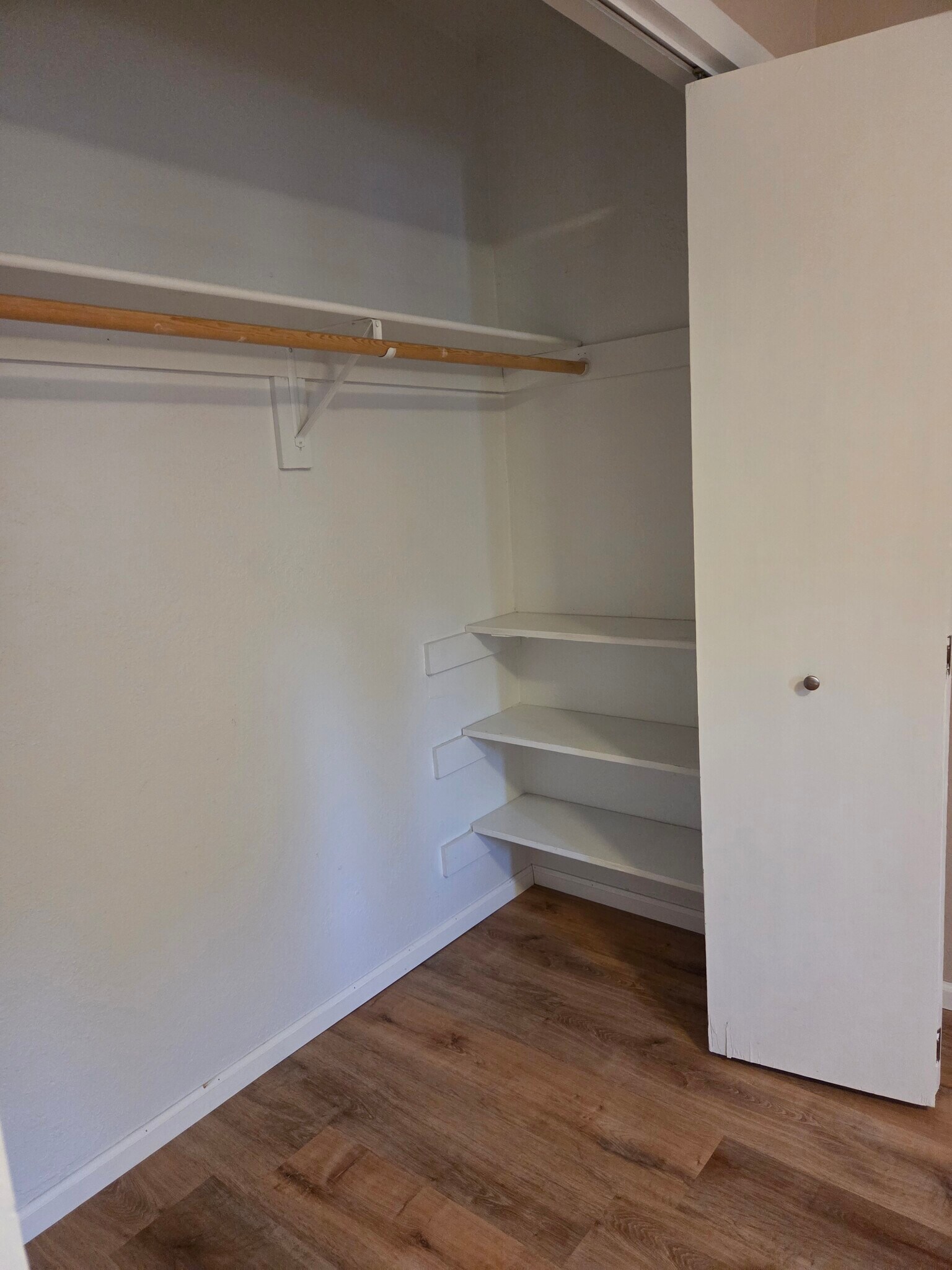 Front bedroom closet with shelves - 610 N Orchard Ave