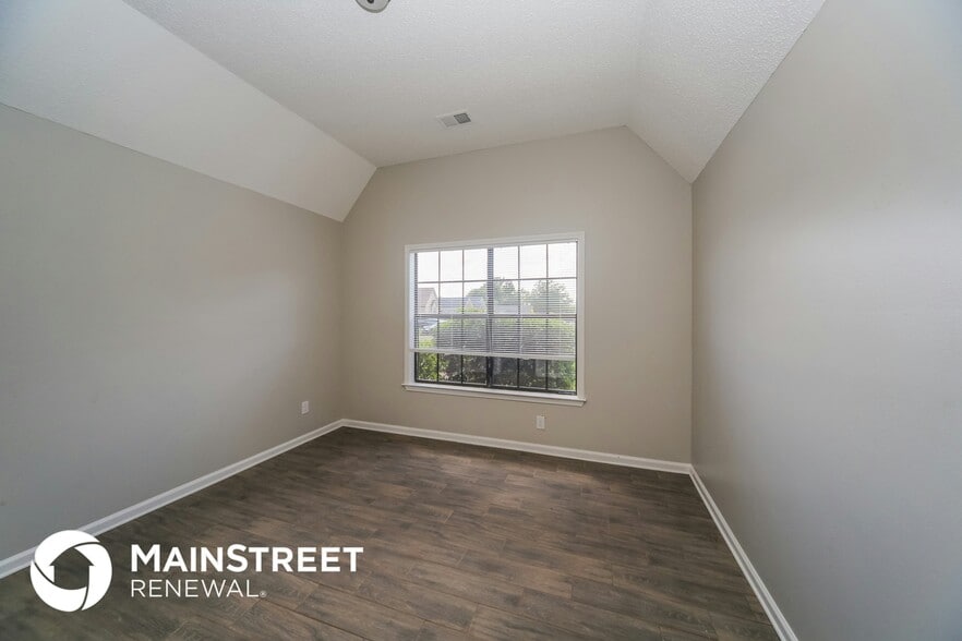 Building Photo - 6740 Stewart Forest Cove E
