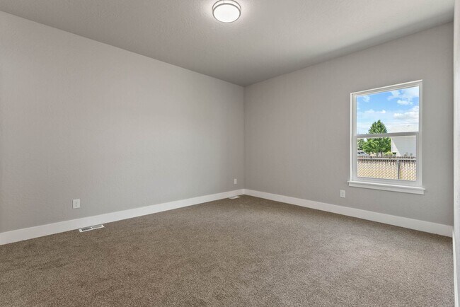 Building Photo - Newly built 4 Bedroom Duplex With Garage