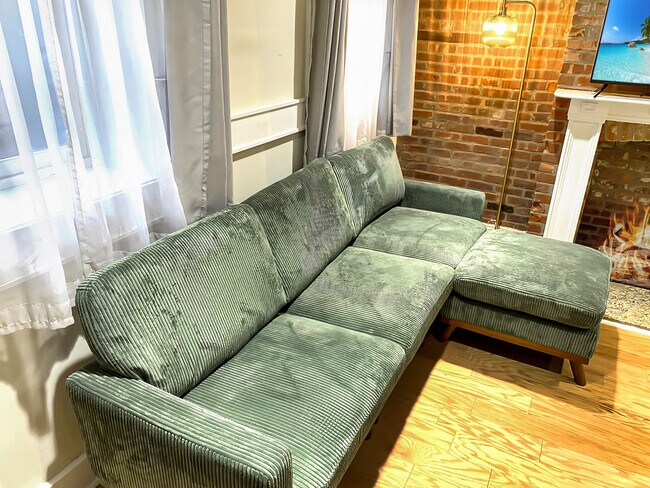 Living room, 55" Roku TV. - 328 Garden St