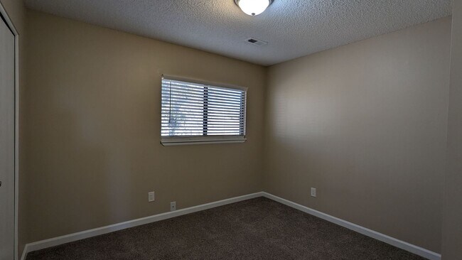 Building Photo - SPACIOUS TWO STORY 3 BED/2.5 BATH WITH FEN...