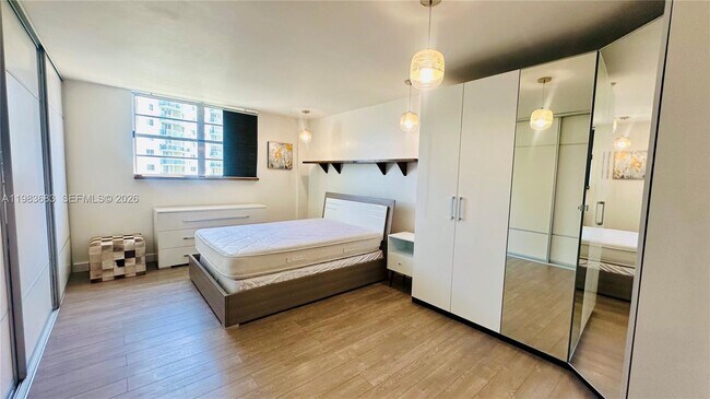 Building Photo - 19390 Collins Ave