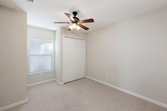 Building Photo - Beautifully Updated & Spacious 3BR/2BA Condo in a Secure Gated Community — Includes Cable, Intern...