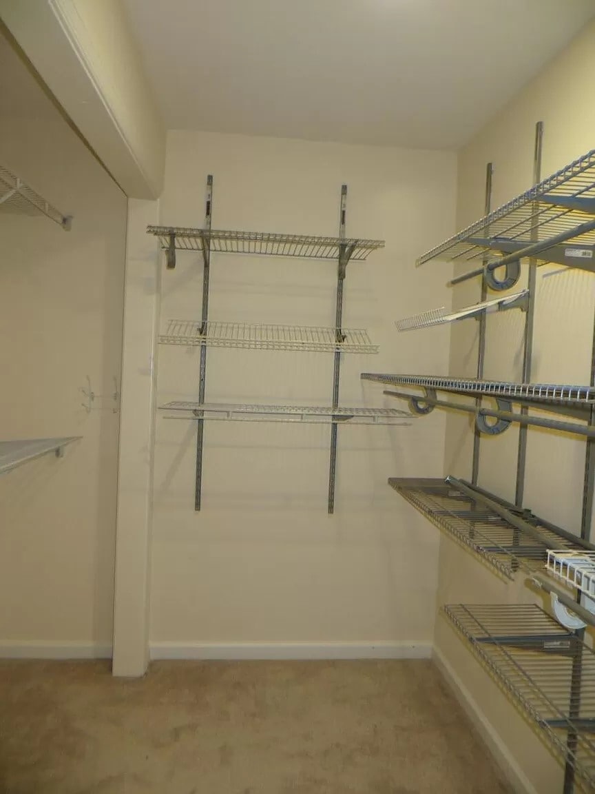 UPPER: Walk-in Closet in Master upstairs. - 7039 Chesley Search Way