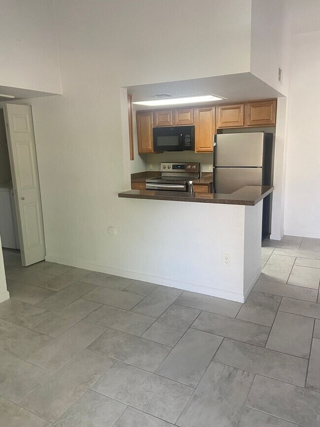 Building Photo - Players Club 14203