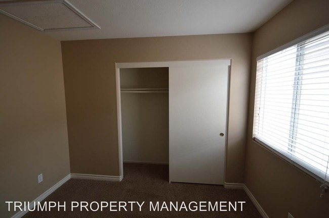 Building Photo - 8820 Spinning Wheel Ave