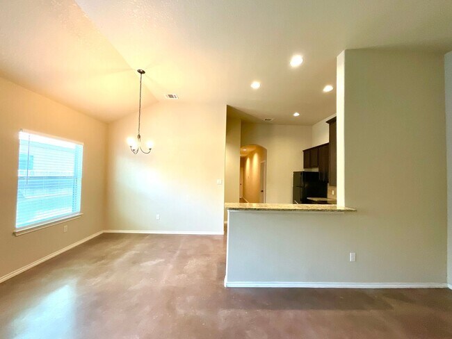 Building Photo - High Ceilings, Fenced Yard & 2-Car Garage – New Braunfels Living!