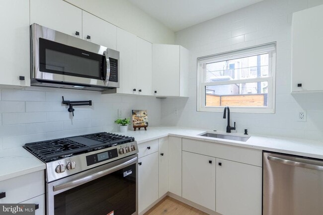 Building Photo - WOW brand new with Deck