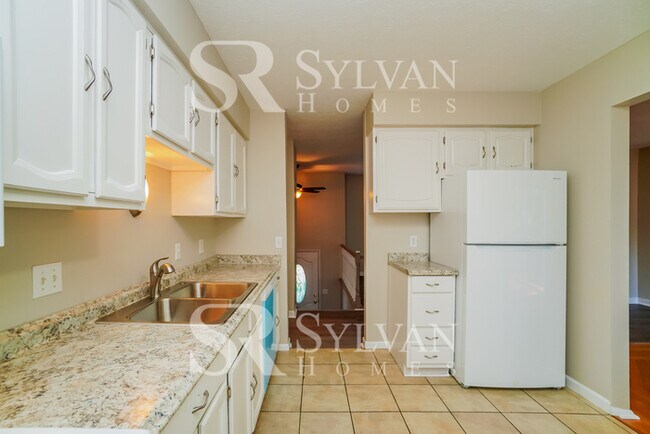 Building Photo - The living is easy in this 3 bedroom, 2.5 bathroom home