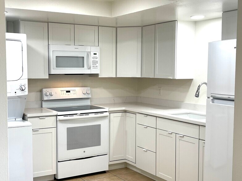 WHITE KITCHEN WITH ALL NEW CABINETS - 1058 W Flint St