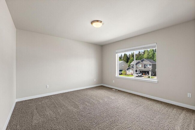 Building Photo - Modern 4-Bedroom Yelm Home with Covered Patio, Outdoor Fireplace & Office/Flex Space!