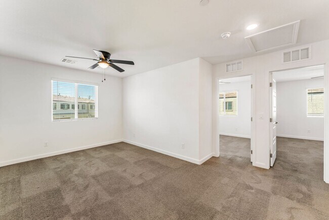 Building Photo - Modern Gated Townhome Living with Resort-Style Community Amenities